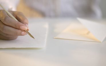 Writing a Letter --- Image by © Royalty-Free/Corbis